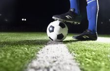 Foot on soccer ball